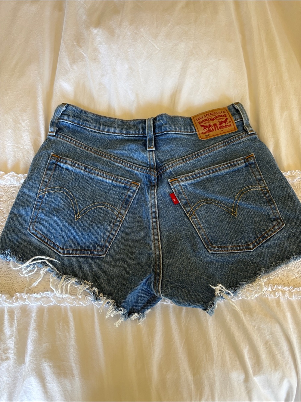 Levi's 501 Blue Denim Jean Cutoff Shorts with Frayed Hem size 25